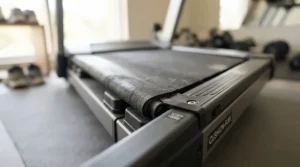 A close-up of a cushioned walking belt on a treadmill for arthritis sufferers designed for low-impact joint-safe cardio.